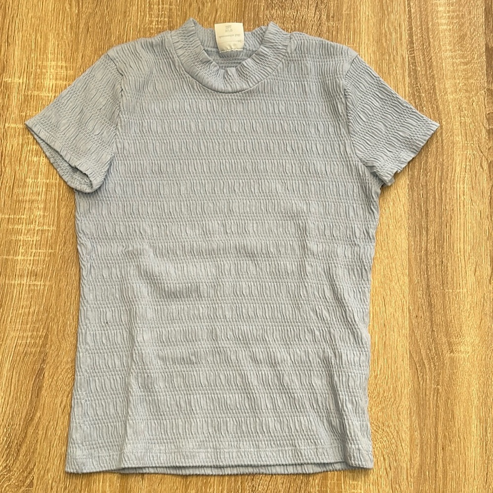 Light blue top